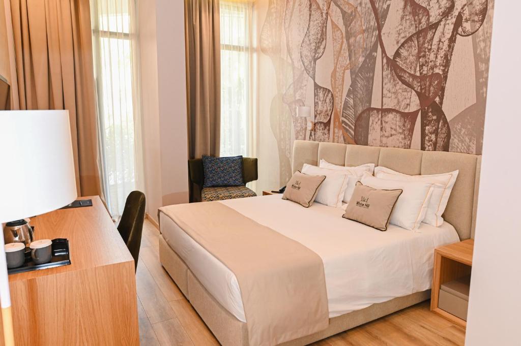 Postel nebo postele na pokoji v ubytování White Hill Hotel, SPA & Conferences