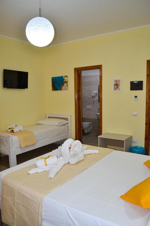 Postel nebo postele na pokoji v ubytování Le Twins -Bed and Breakfast