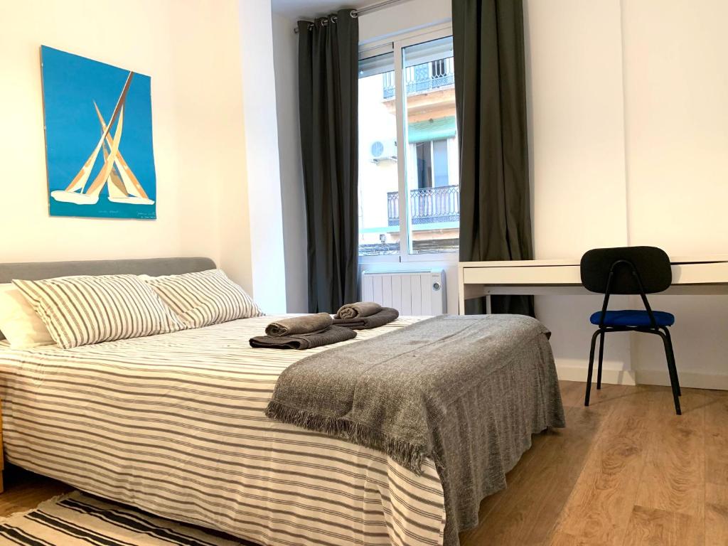 Postel nebo postele na pokoji v ubytování 2 Apartamento TERRAZA Free Wifi