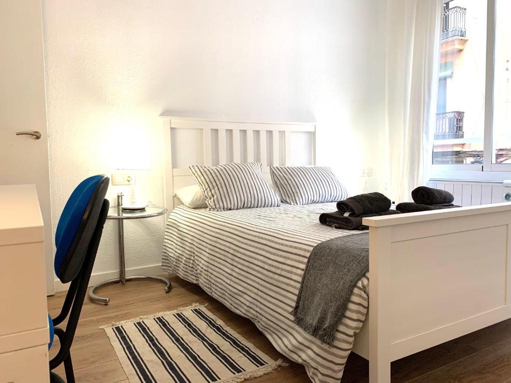 Postel nebo postele na pokoji v ubytování 2 Apartamento TERRAZA Free Wifi