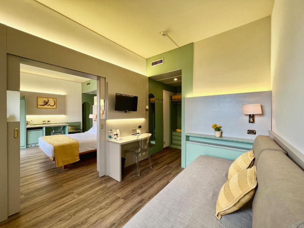 Postel nebo postele na pokoji v ubytování Hotel Marina