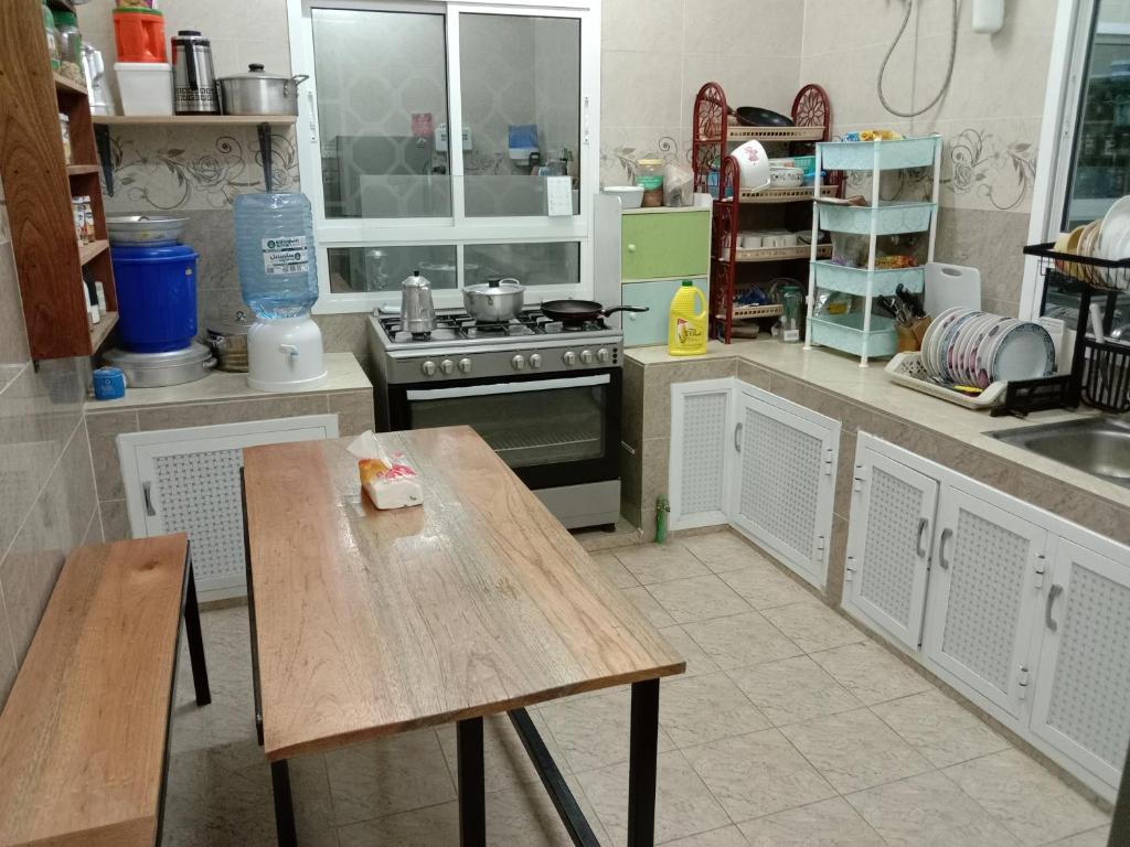 Kuchyň nebo kuchyňský kout v ubytování Nima guest house