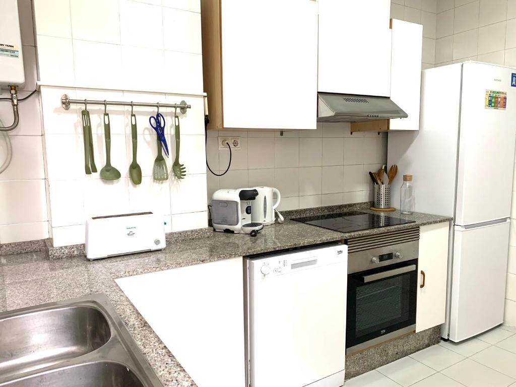 Kuchyň nebo kuchyňský kout v ubytování 2 Apartamento TERRAZA Free Wifi