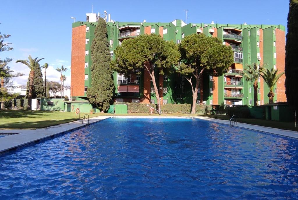 The swimming pool at or near Heliomar 3 dormitorios con Piscina, Wifi, Aparcamiento & Parque infantil