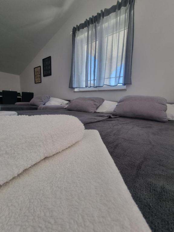 Postel nebo postele na pokoji v ubytování Apartment Miric