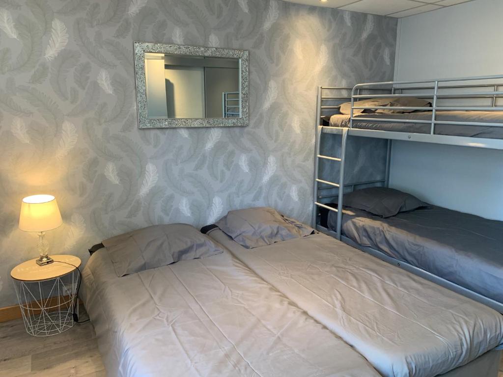 Postel nebo postele na pokoji v ubytování Hotel Caplandes