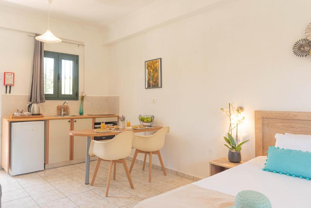 Postel nebo postele na pokoji v ubytování Yianetta Hotel Apartments