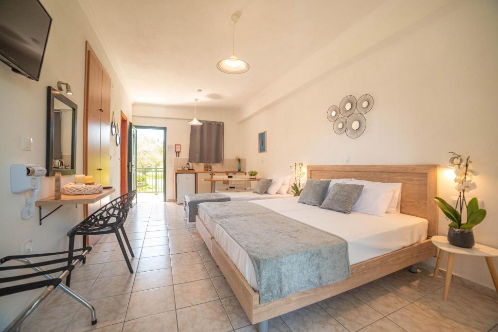 Postel nebo postele na pokoji v ubytování Yianetta Hotel Apartments
