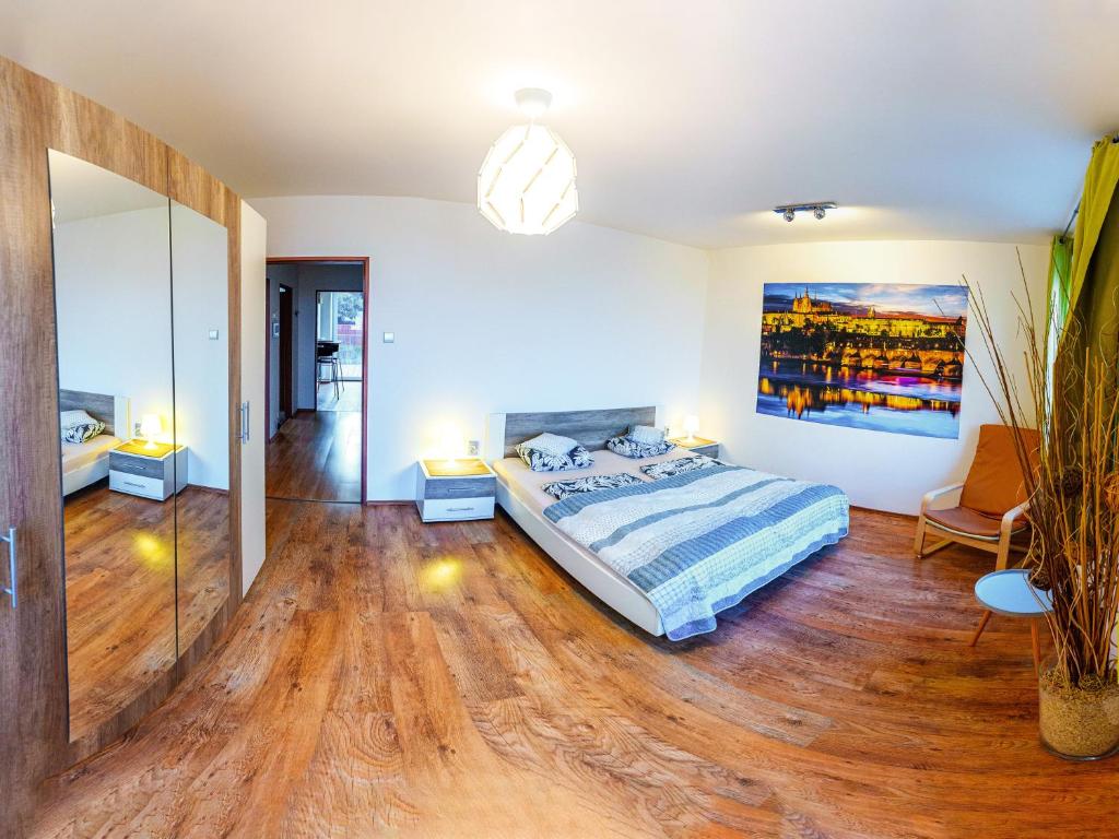 Postel nebo postele na pokoji v ubytování Apartment Pod Sychrovem