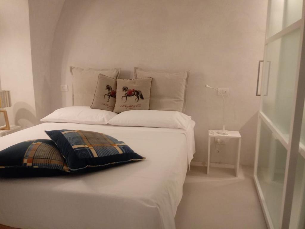 Postel nebo postele na pokoji v ubytování Residenza Corso Baccio