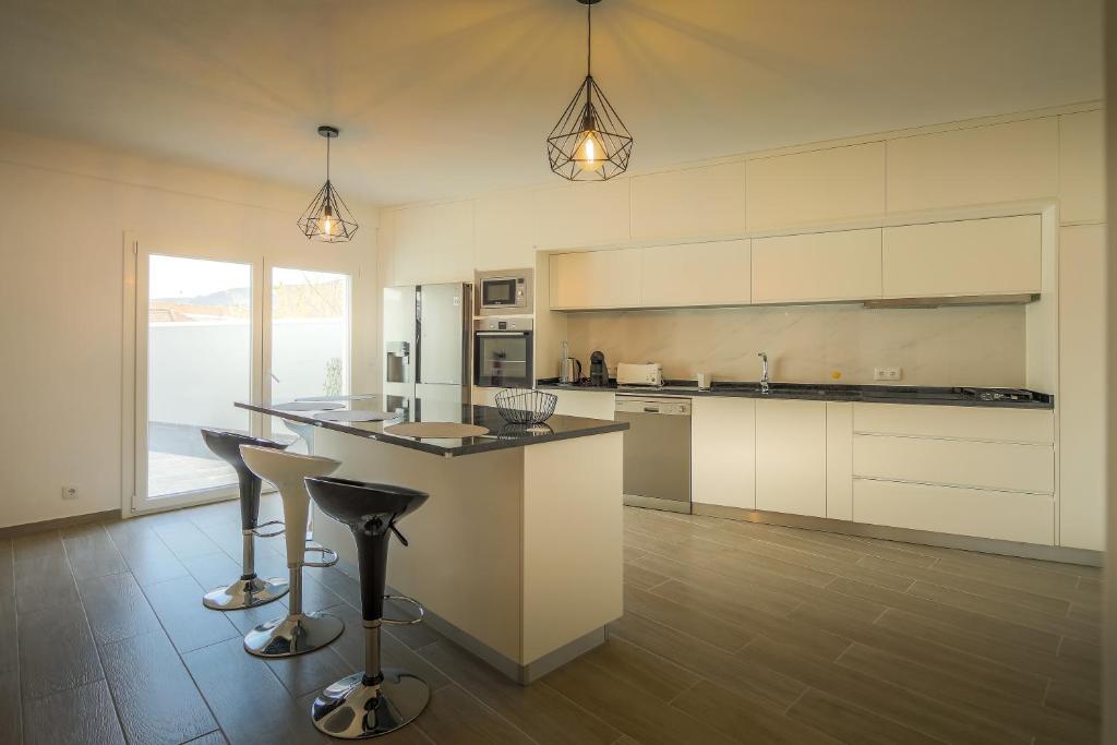 Kuchyň nebo kuchyňský kout v ubytování Casa dos 4 Caminhos - Guest House Douro