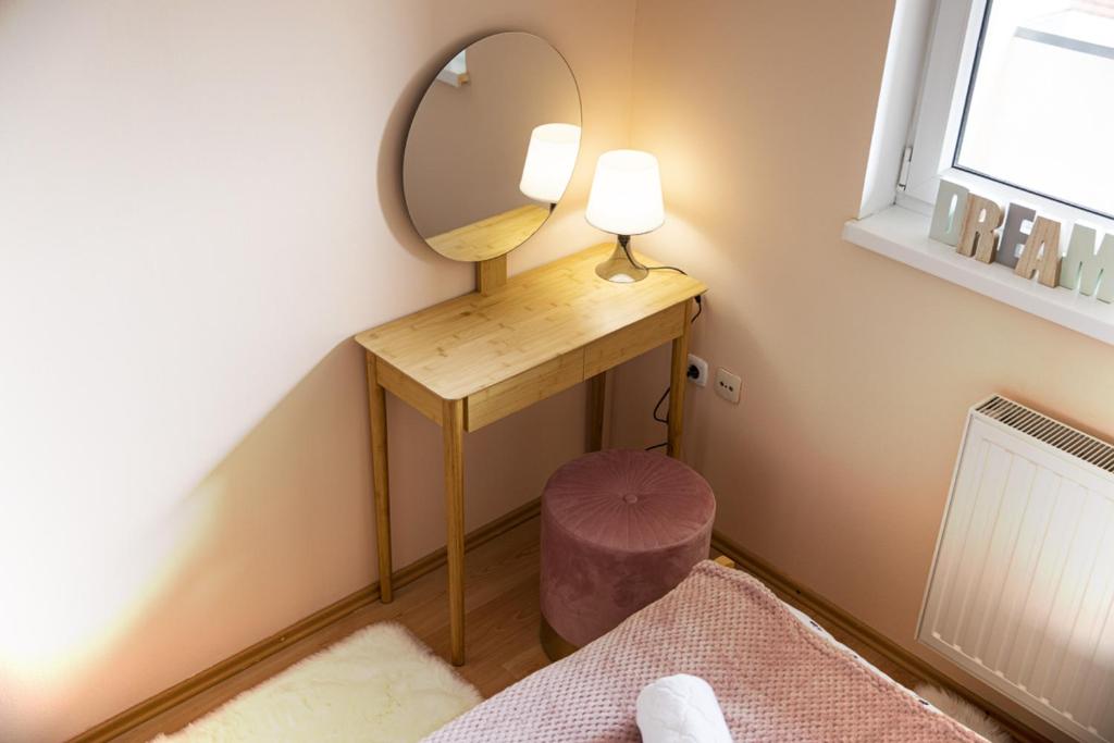 Posteľ alebo postele v izbe v ubytovaní Apartman Tara