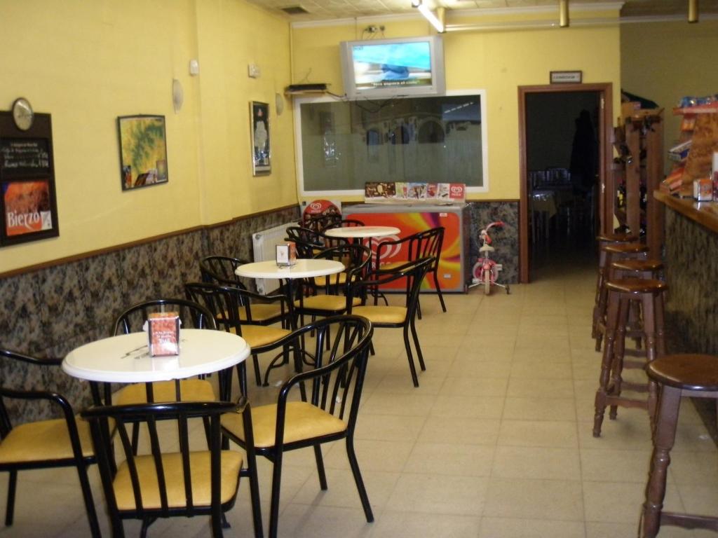 A restaurant or other place to eat at Hostal la Cuesta