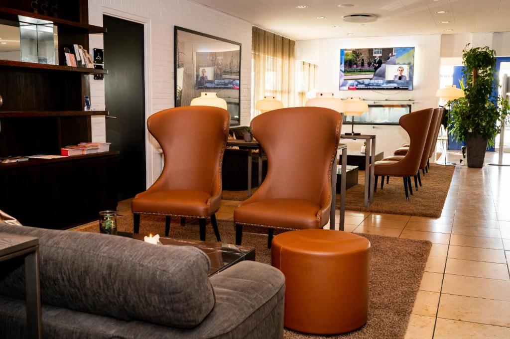 Televízia a/alebo spoločenská miestnosť v ubytovaní Hotel Svanen Billund