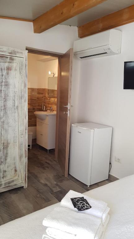 Postel nebo postele na pokoji v ubytování Aliga