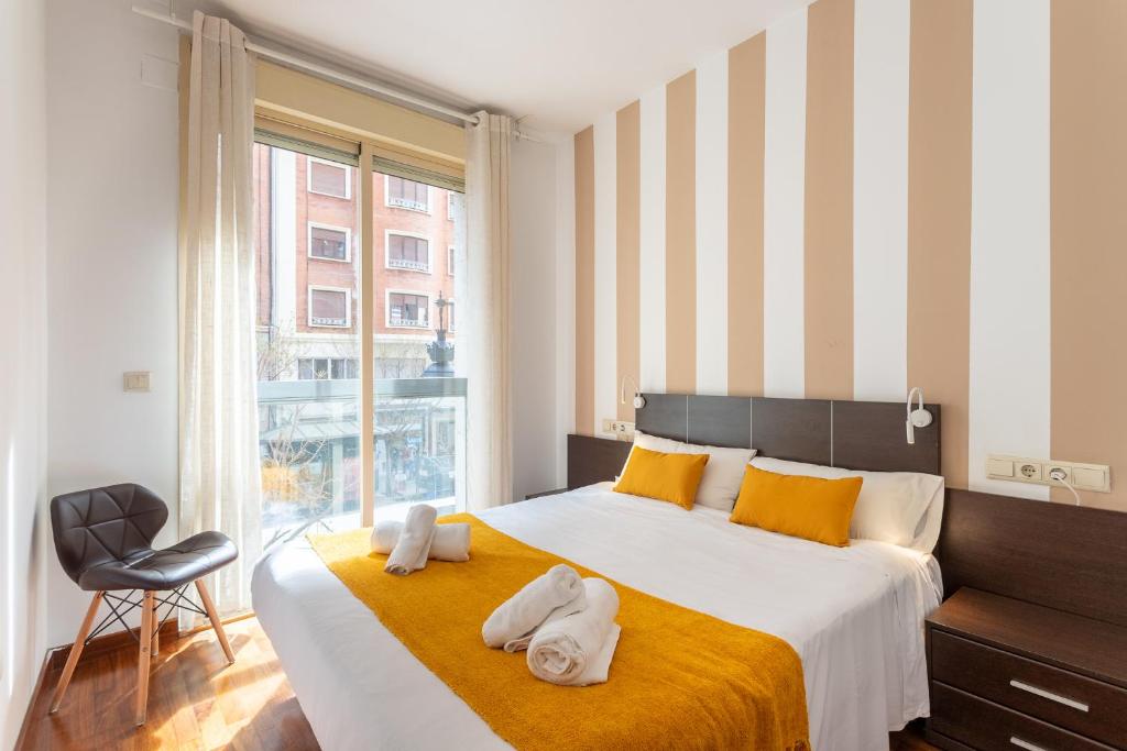 Posteľ alebo postele v izbe v ubytovaní Baron Suites