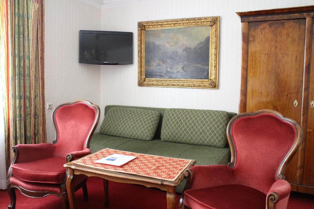 TV a/nebo společenská místnost v ubytování Pension Suzanne