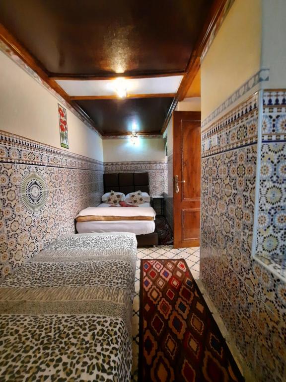 Postel nebo postele na pokoji v ubytování Riad 112