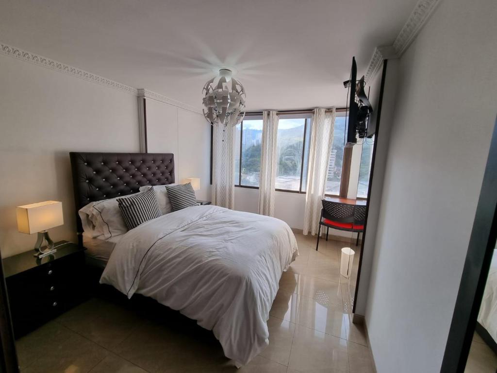 Ένα ή περισσότερα κρεβάτια σε δωμάτιο στο Penthouse