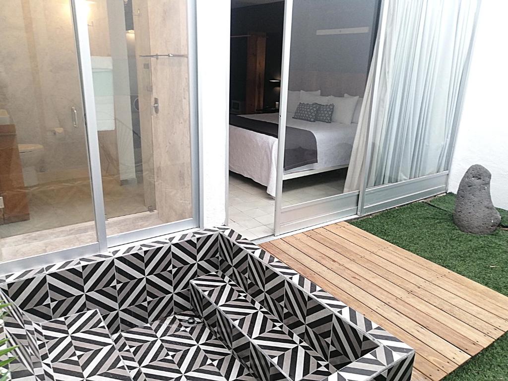 Postel nebo postele na pokoji v ubytování Hotel CLARUM 101