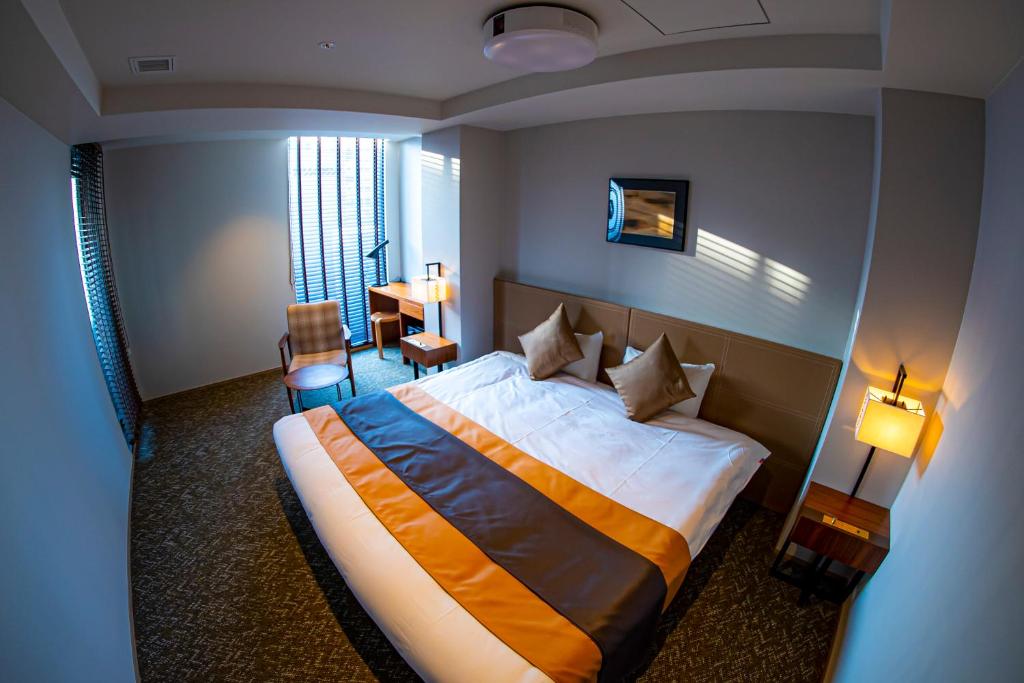 Postel nebo postele na pokoji v ubytování Hotel S-Presso South