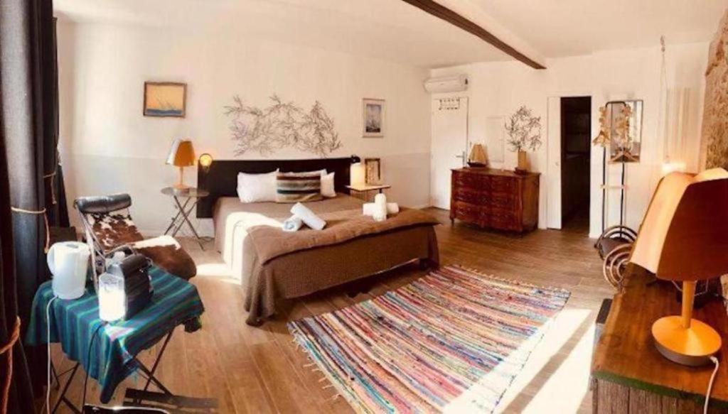 Postel nebo postele na pokoji v ubytování Pitibi Maison d'Hote