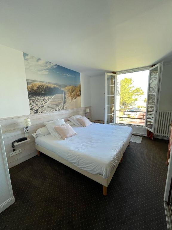 Cama ou camas em um quarto em Chez-Marion