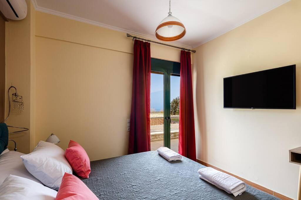 Telewizja i/lub zestaw kina domowego w obiekcie Karma House