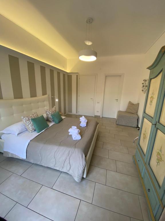 Postel nebo postele na pokoji v ubytování Lemon Rooms Sorrento