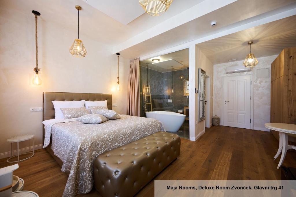 Postel nebo postele na pokoji v ubytování Hiša Ančka, Boutique Hotel & Maja Rooms