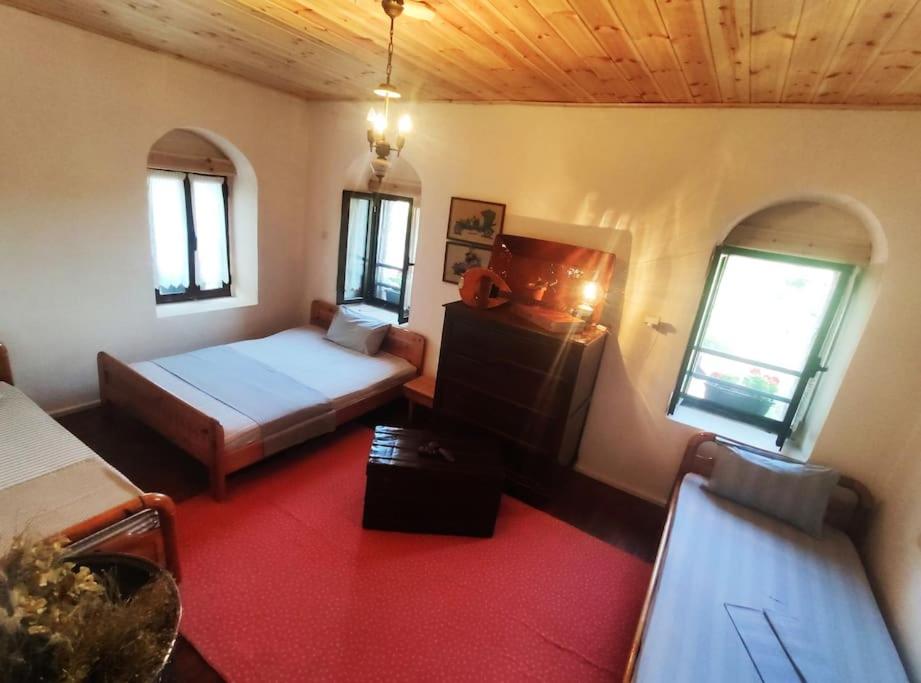 Posteľ alebo postele v izbe v ubytovaní Panorea's Stone House