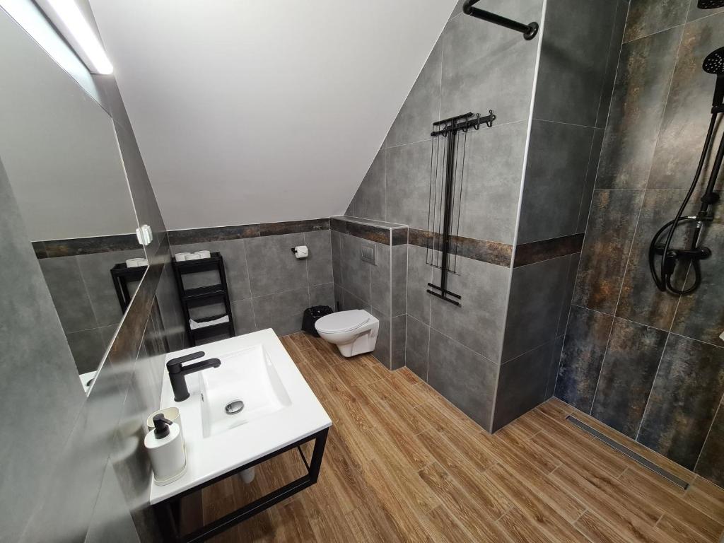 Koupelna v ubytování Czar Mamry Apartamenty