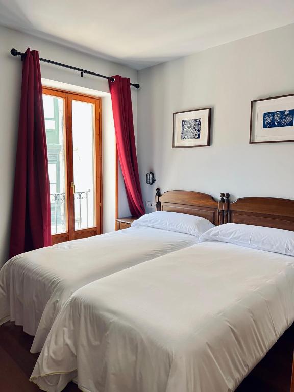 Postel nebo postele na pokoji v ubytování Hotel Branka