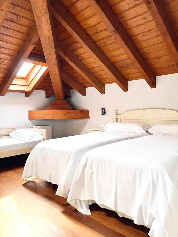 Postel nebo postele na pokoji v ubytování Hotel Branka