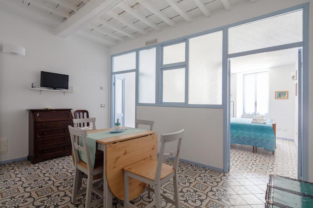 A television and/or entertainment centre at Casa GiGio 011030-LT-0223