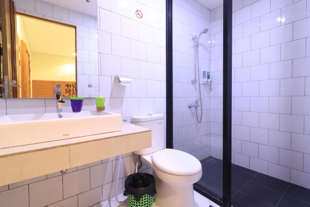 Koupelna v ubytování Locus Rooms