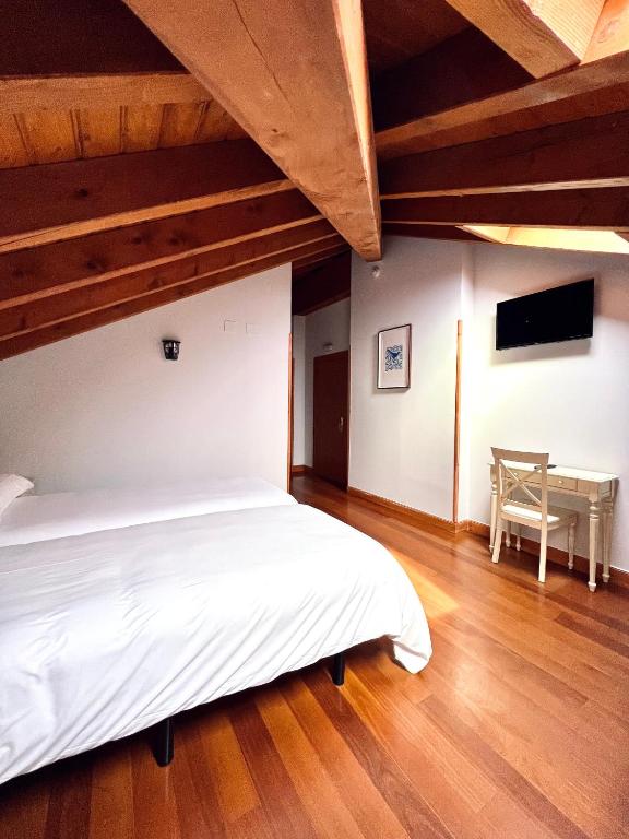 Postel nebo postele na pokoji v ubytování Hotel Branka