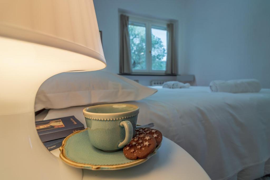 Postel nebo postele na pokoji v ubytování CASA CAMILLA Relax con una vista da sogno