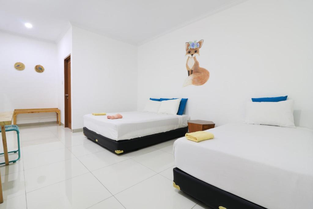 Postel nebo postele na pokoji v ubytování Locus Rooms