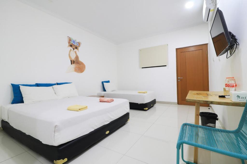 Postel nebo postele na pokoji v ubytování Locus Rooms