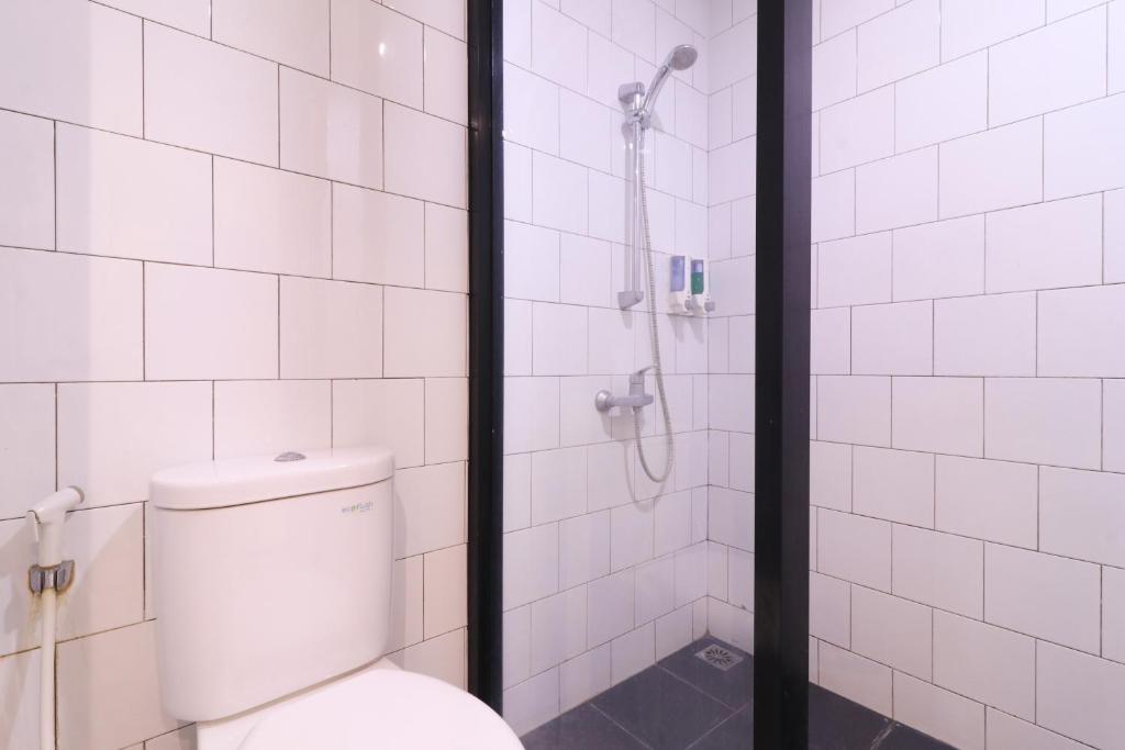 Koupelna v ubytování Locus Rooms