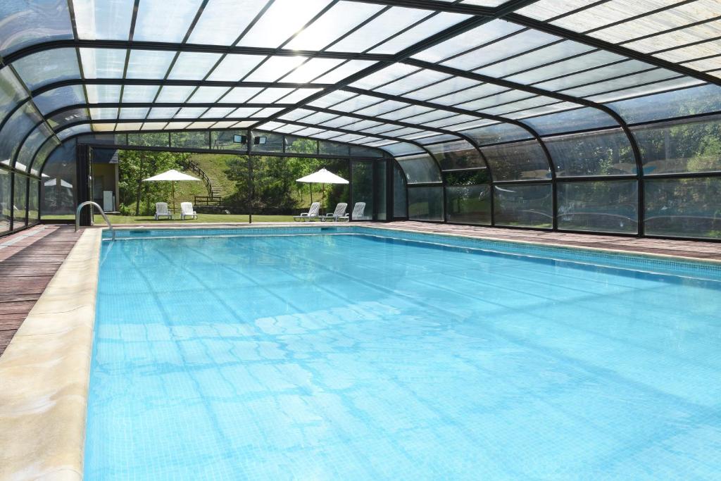 Bazén v ubytování RVHotels Tuca nebo v jeho okolí