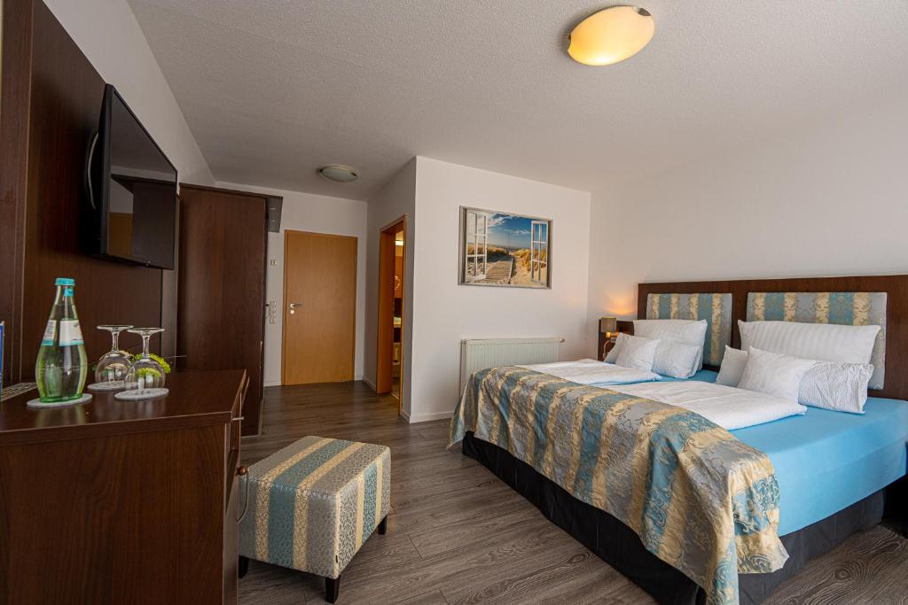 Postel nebo postele na pokoji v ubytování Hotel Nordstern