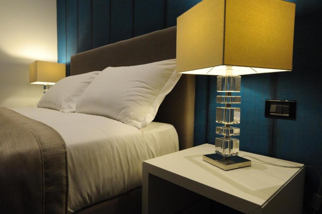 Postel nebo postele na pokoji v ubytování Hotel Up Wellness & Spa