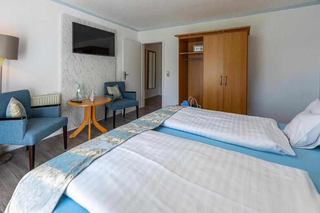 Postel nebo postele na pokoji v ubytování Hotel Nordstern