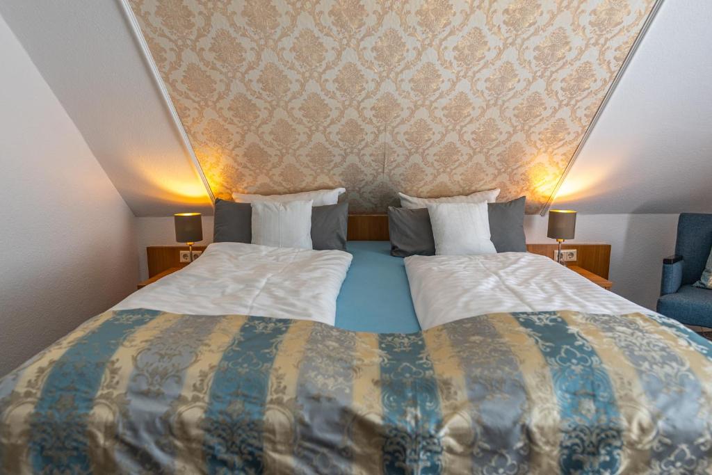 Postel nebo postele na pokoji v ubytování Hotel Nordstern