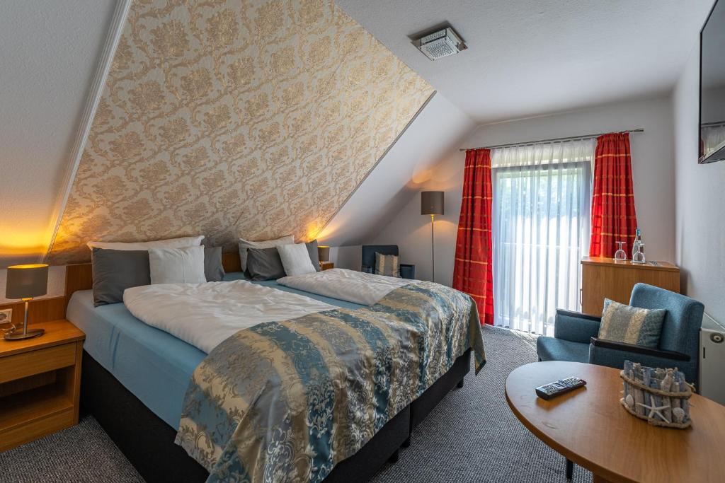Postel nebo postele na pokoji v ubytování Hotel Nordstern