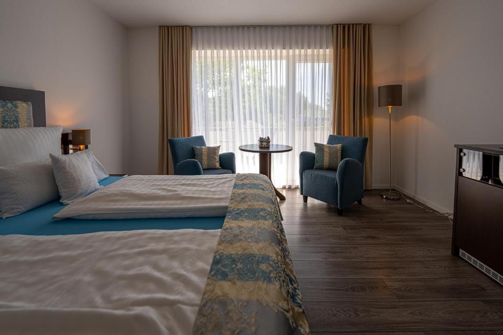 Postel nebo postele na pokoji v ubytování Hotel Nordstern