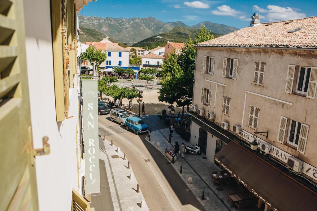 a view of a street from a building at Hôtel & Résidence San Roccu in Saint-Florent