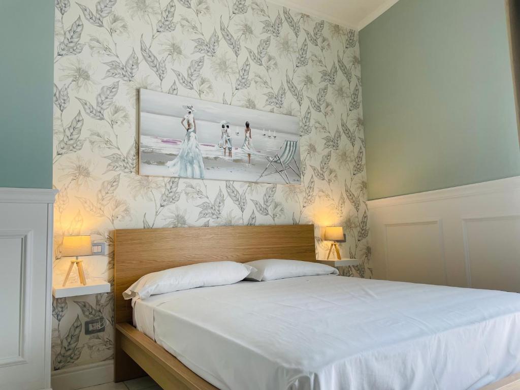 Łóżko lub łóżka w pokoju w obiekcie Mirage Rooms